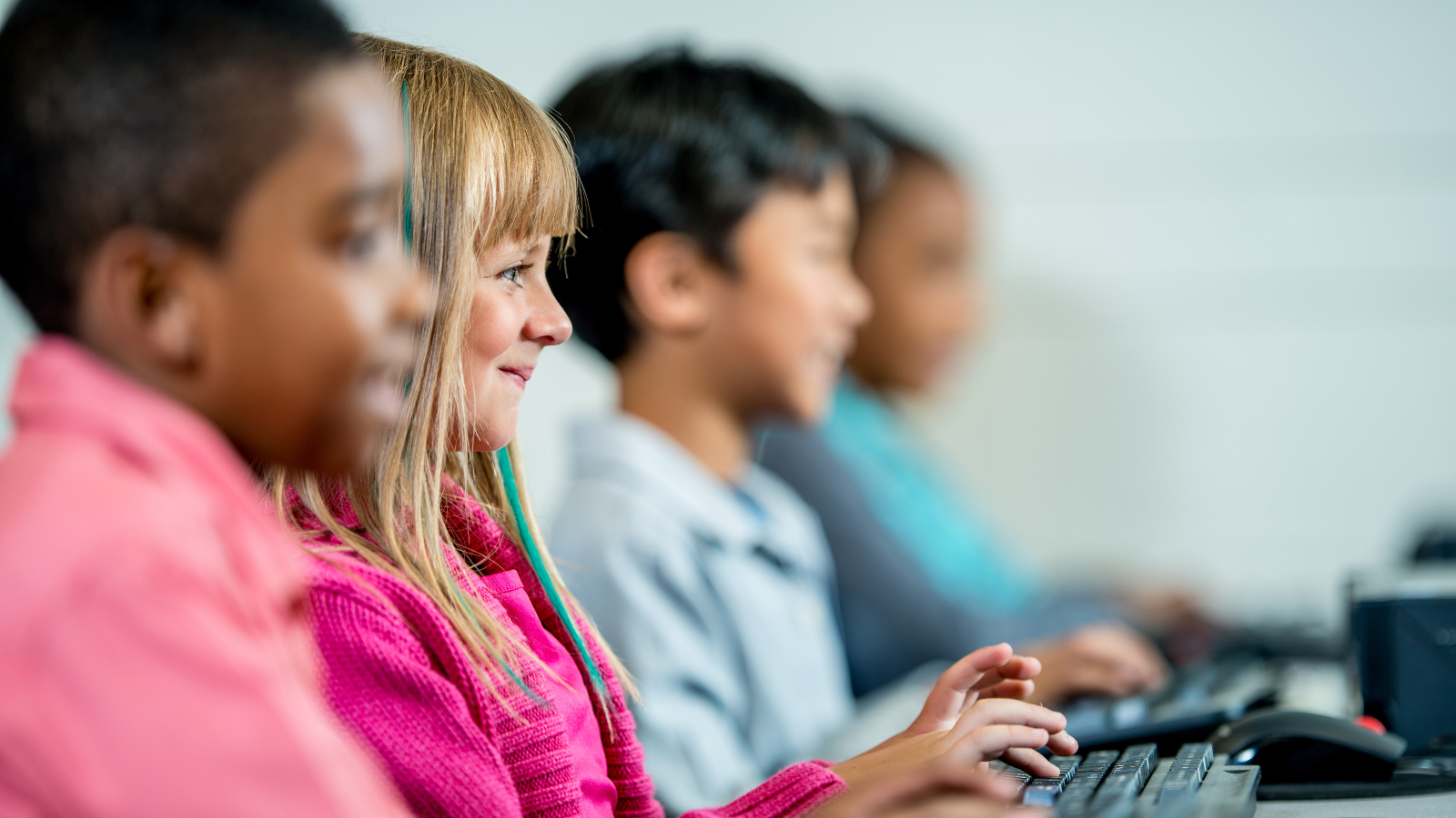 Elementary students working on their computers at school